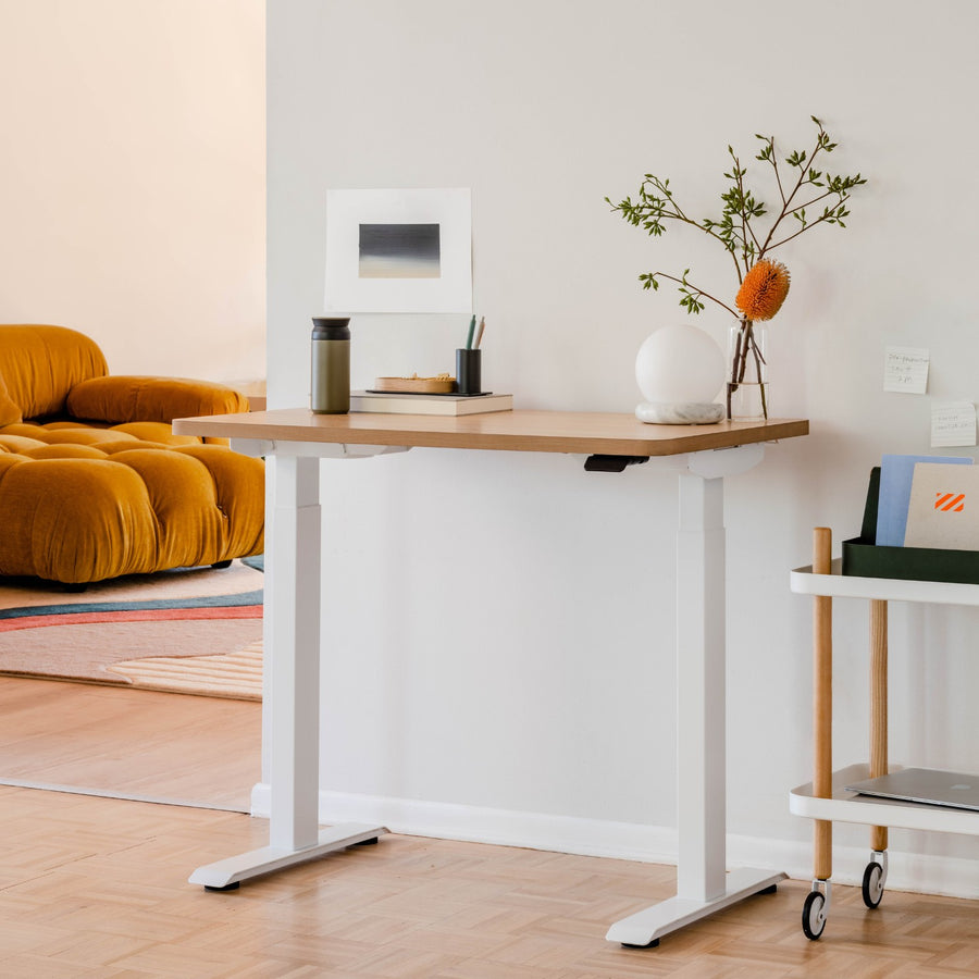 Branch Duo standing desk in woodgrain and white